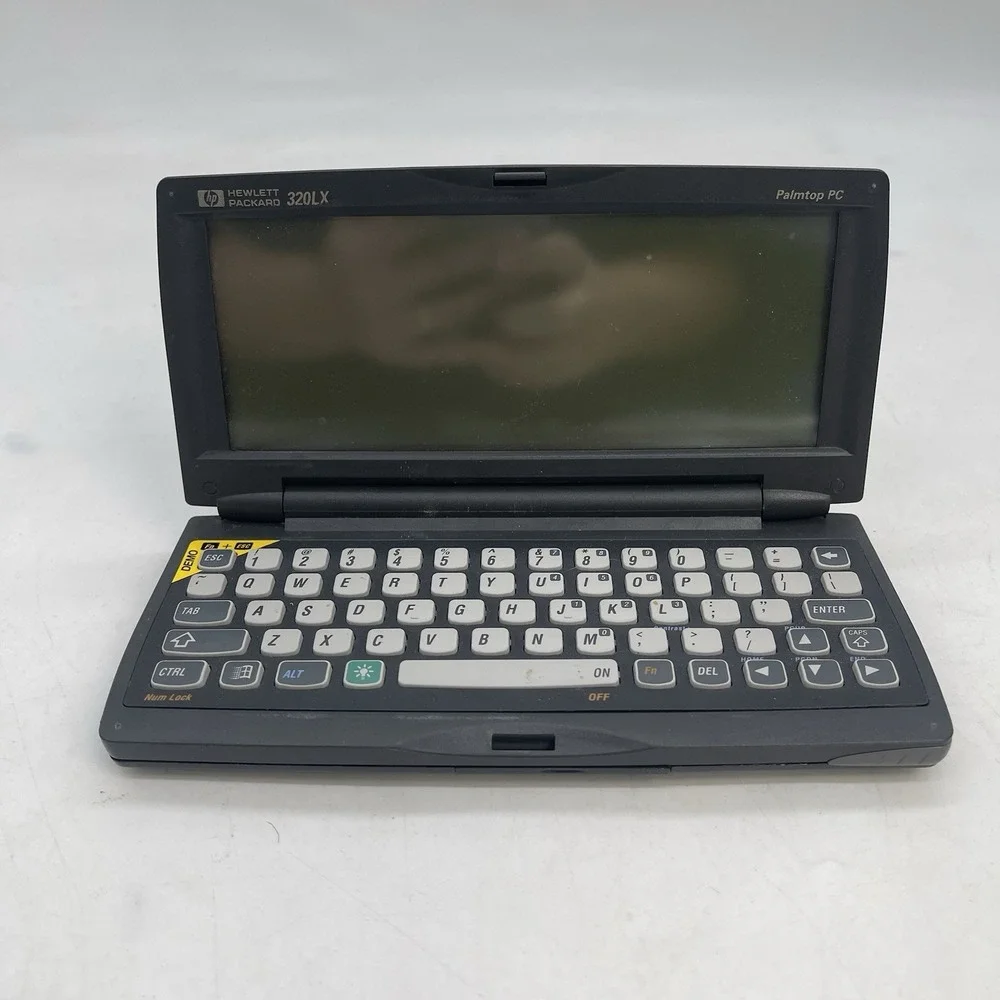 Hewlett Packard HP 320LX Handheld Palmtop PC Computer NO STYLUS Untested